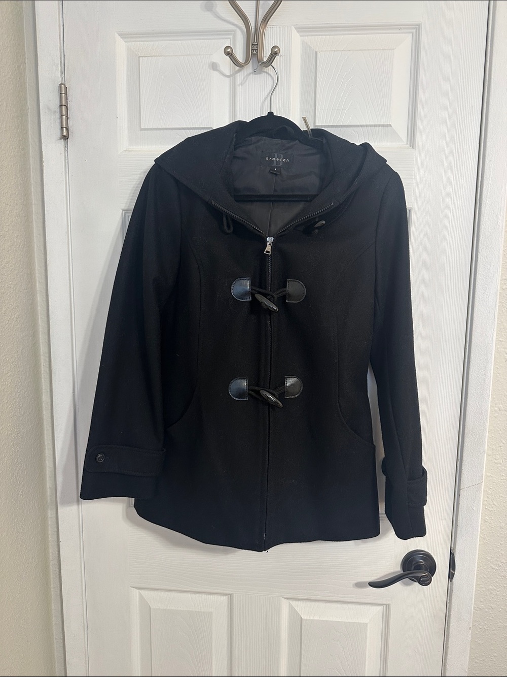 Braetan women's hooded duffle coat featuring toggle closures and a zipper front.
